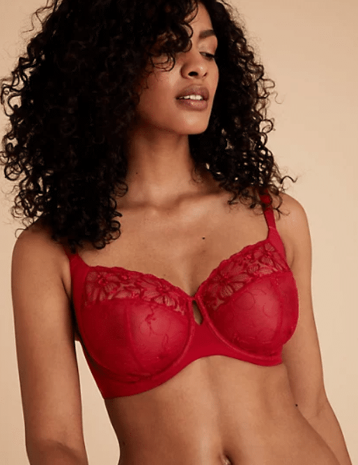 woman in a red underwired bra cup f up to cup j