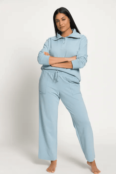 woman wearing a plus size loungewear set in blue